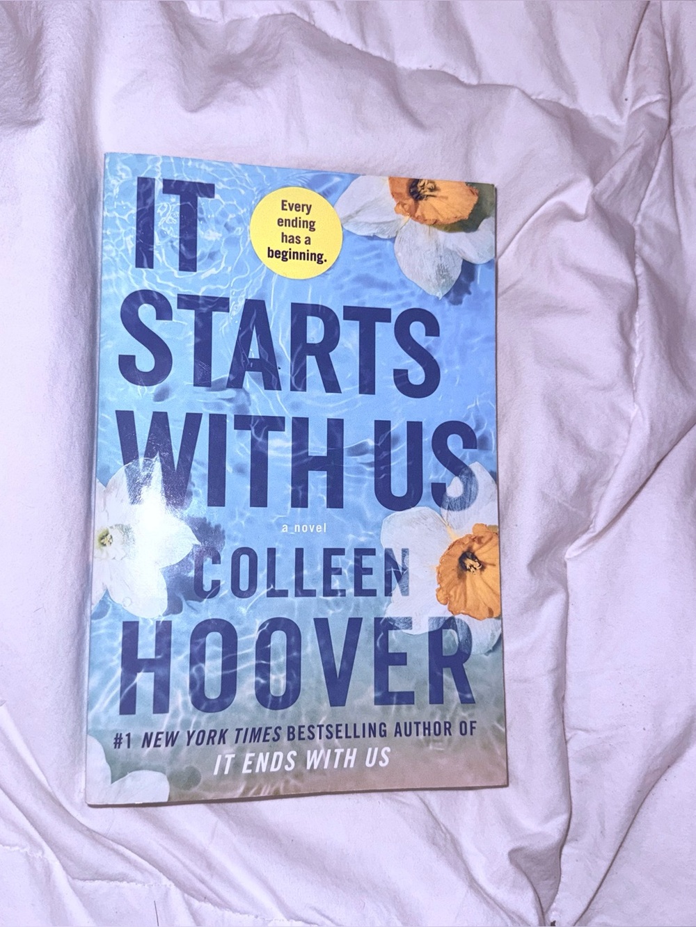 It Starts With Us - Blue Paperback Novel